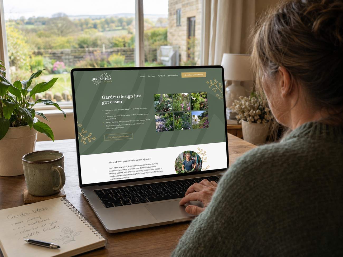 Botanica Design website on mobile, held in the garden