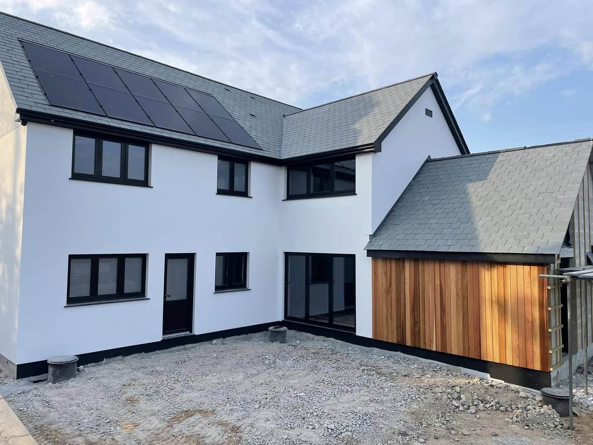 New build with black uPVC windows and doors